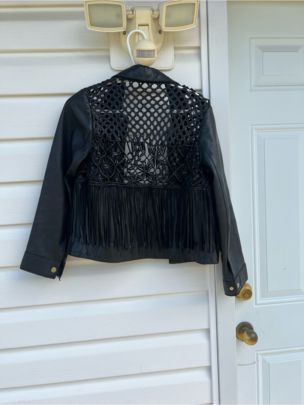 Uterque Black Fringe Leather Jacket with Crochet Back